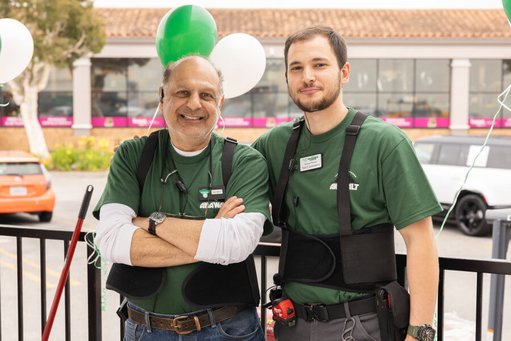 Two Anawalt employees pose for a photo