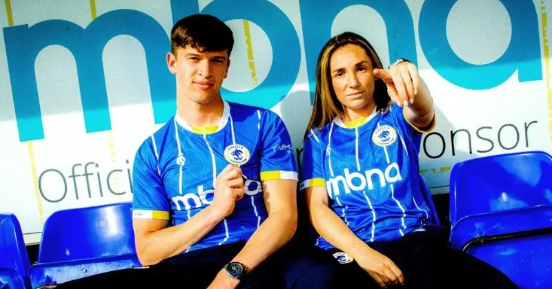 players wearing chester fc 2023-24 home shirt in blue and white