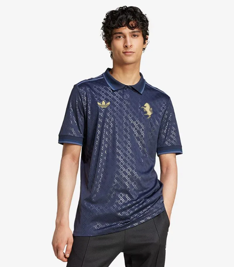 juventus third shirt in navy blue with collar and gold pattern and details 