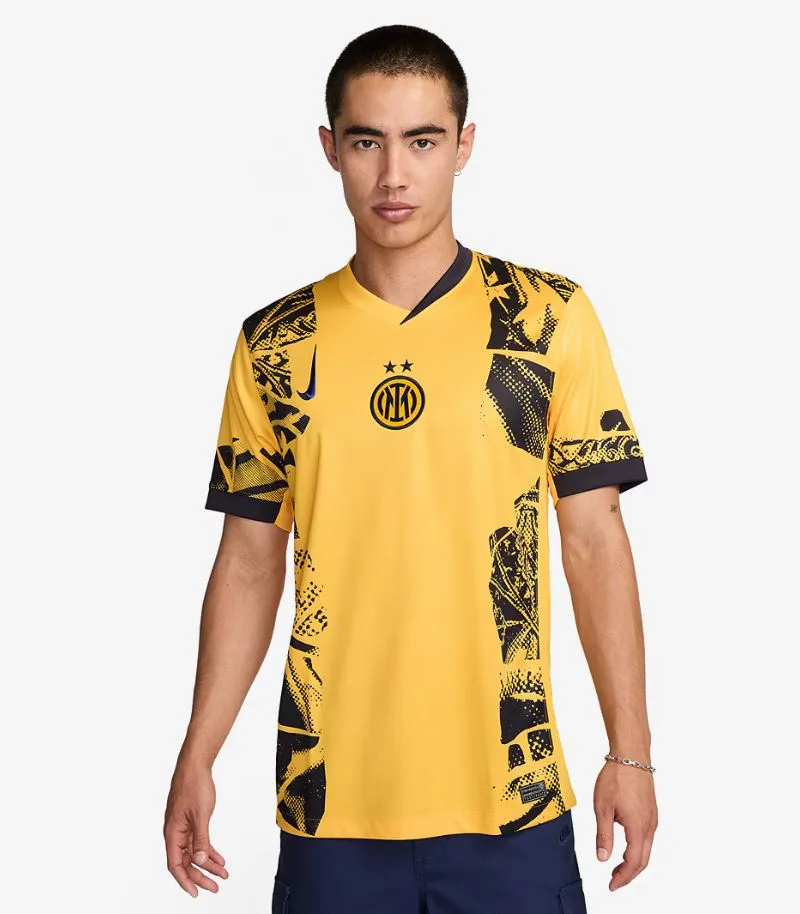 inter milan third shirt in yellow with black graphics down each side