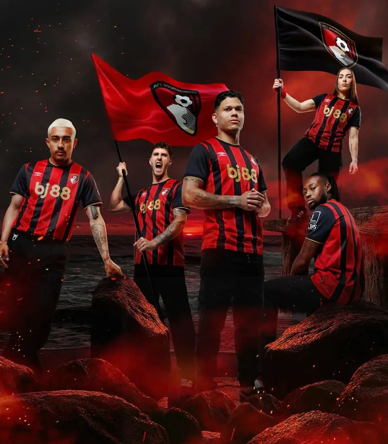 players wearing new red and black striped bournemouth kit