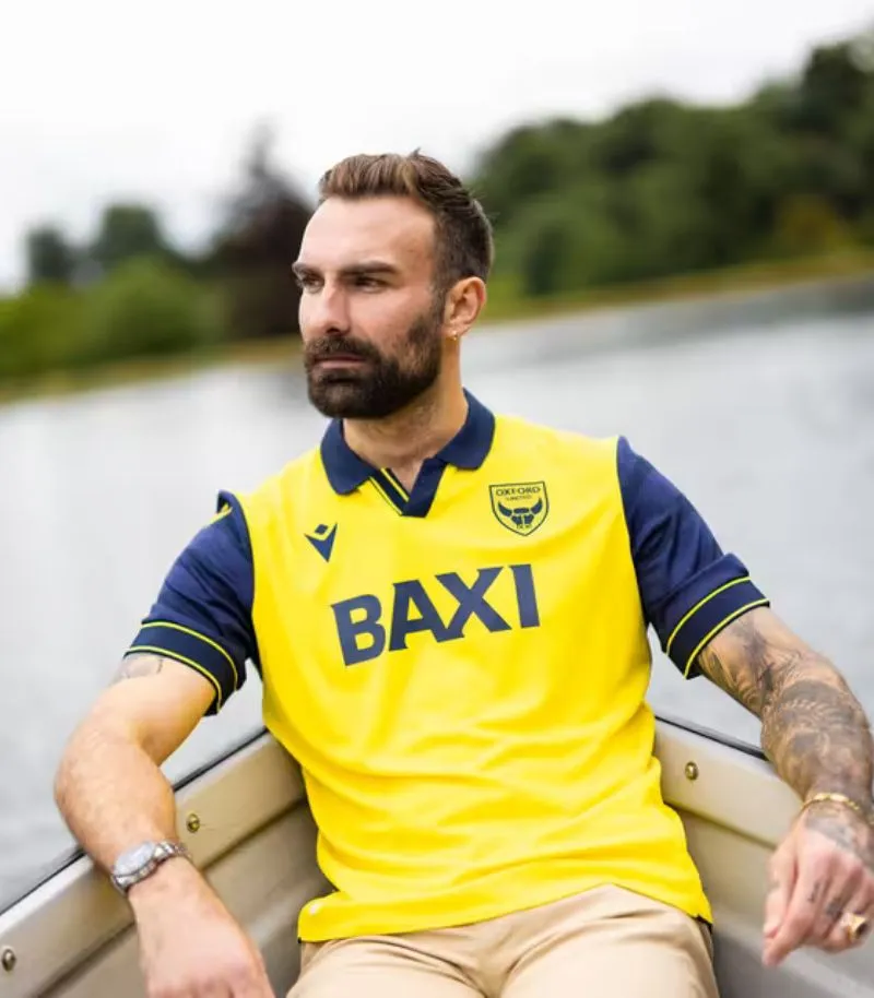 new oxford united home kit in yellow and navy