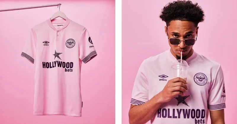 Pink Brentford away shirt with purple details 