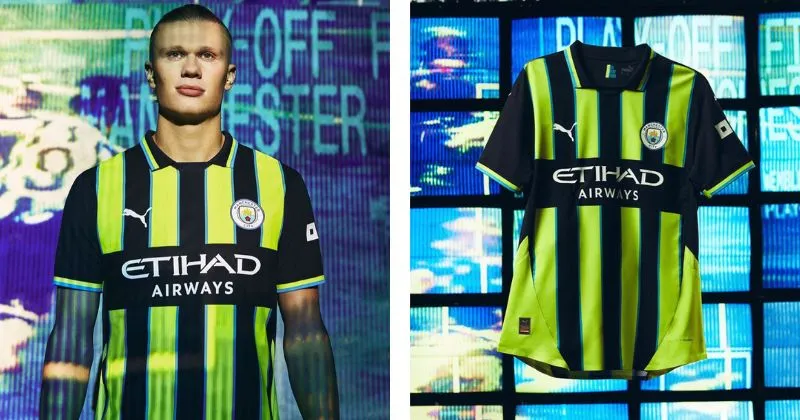 Man City away kit, with neon yellow and black stripes and light blue detailing 