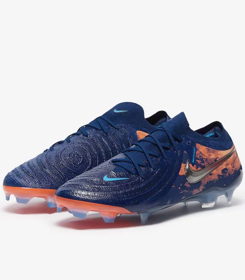 nike phantom gx 2 football boots in Haaland edition, which is navy blue with orange graphics