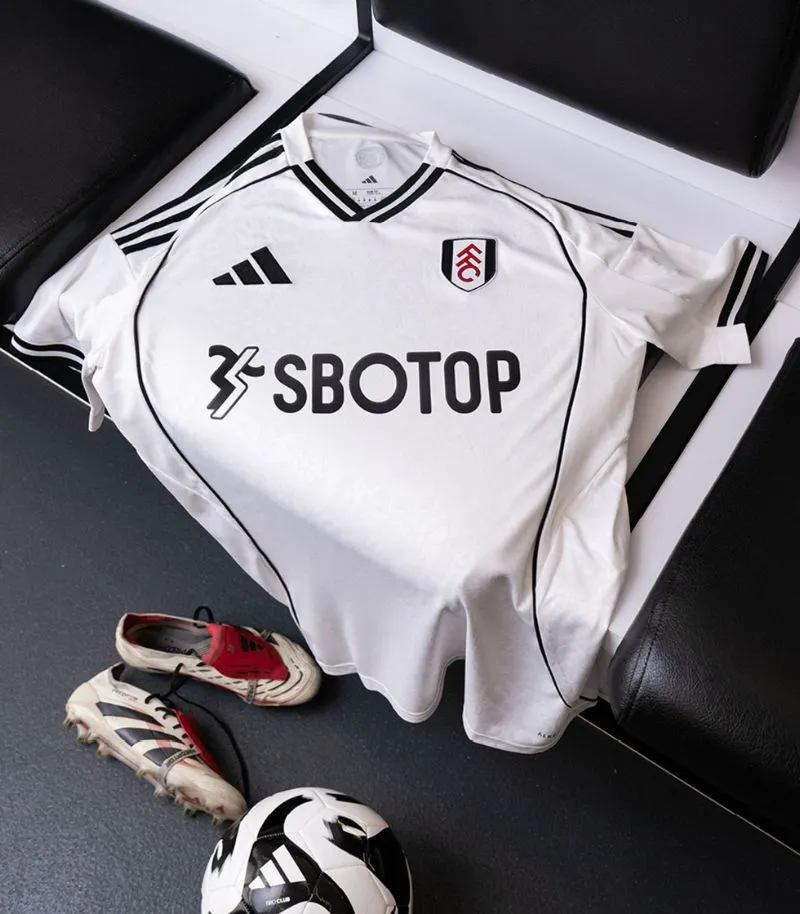 white fulham home kit with black details