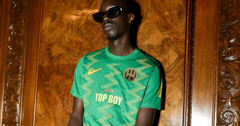 model wearing hackney wick fc 2023-24 home shirt in green