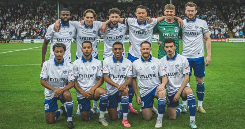 bury fc 2023-24 team wearing home shirt in white