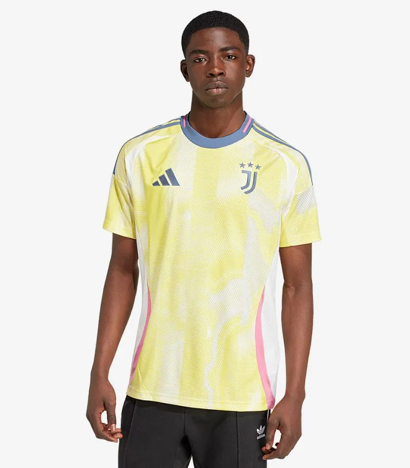 juventus away shirt in yellow with white, blue and pink details 