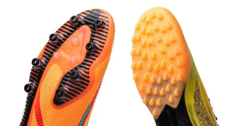 moulded football boot sole and astro turf boot sole both in orange