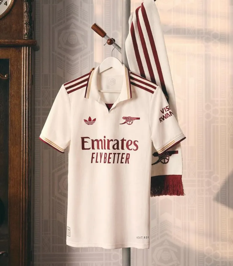 arsenal third kit 2025 white with red and gold details 