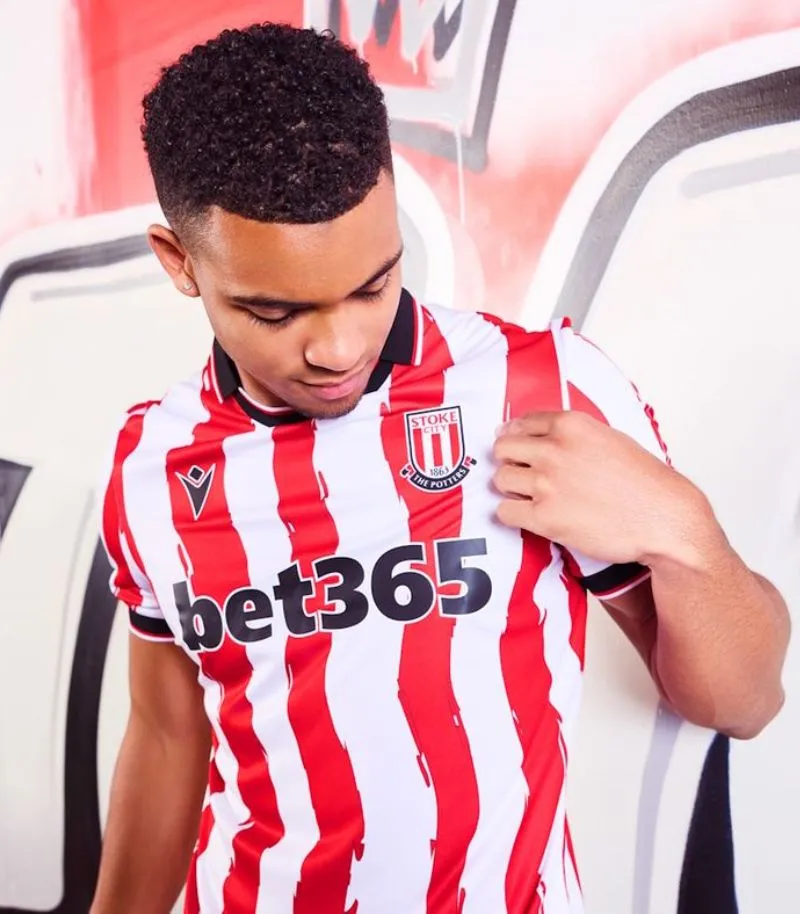 new stoke city home kit in red and white stripes