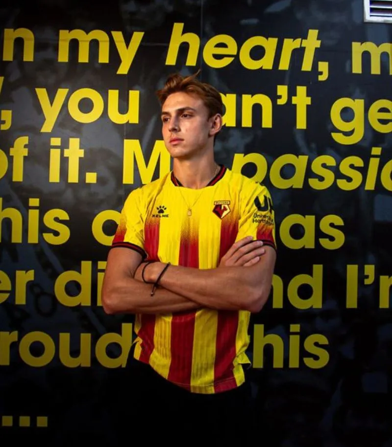 new watford home shirt in yellow with red stripes
