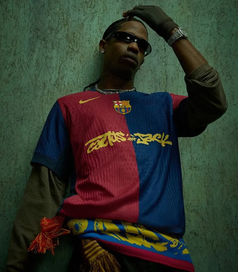 travis scitt wearing barcelona shirt