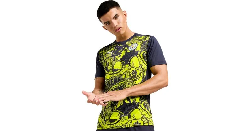 Manchester City pre-match football shirt in neon yellow and black