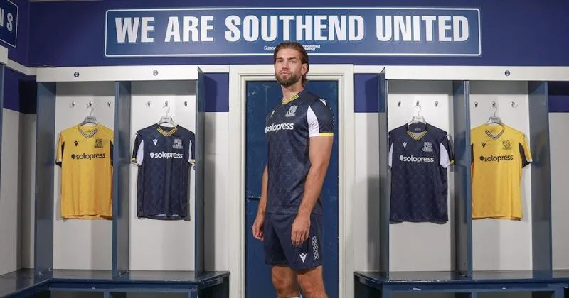 player wearing southend united 2023-24 home shirt in blue