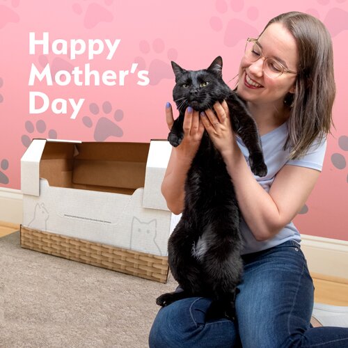Happy Mother's Day! A young woman hugging her black cat in front of a Kitty Poo Club Disposable Litter Box
