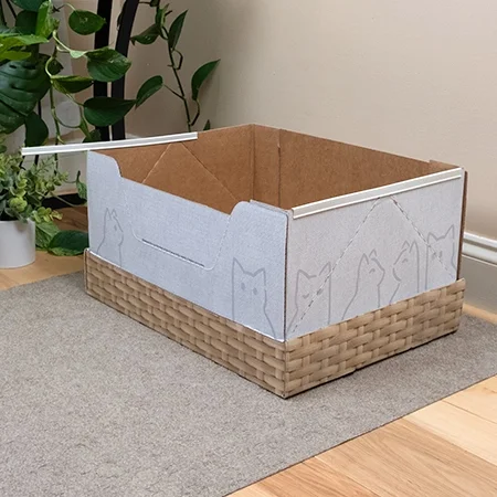 Rails being added to left and right side of the litter box