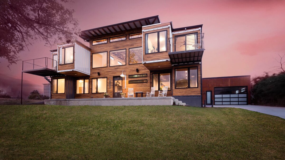 The exterior of a luxury shipping container home.