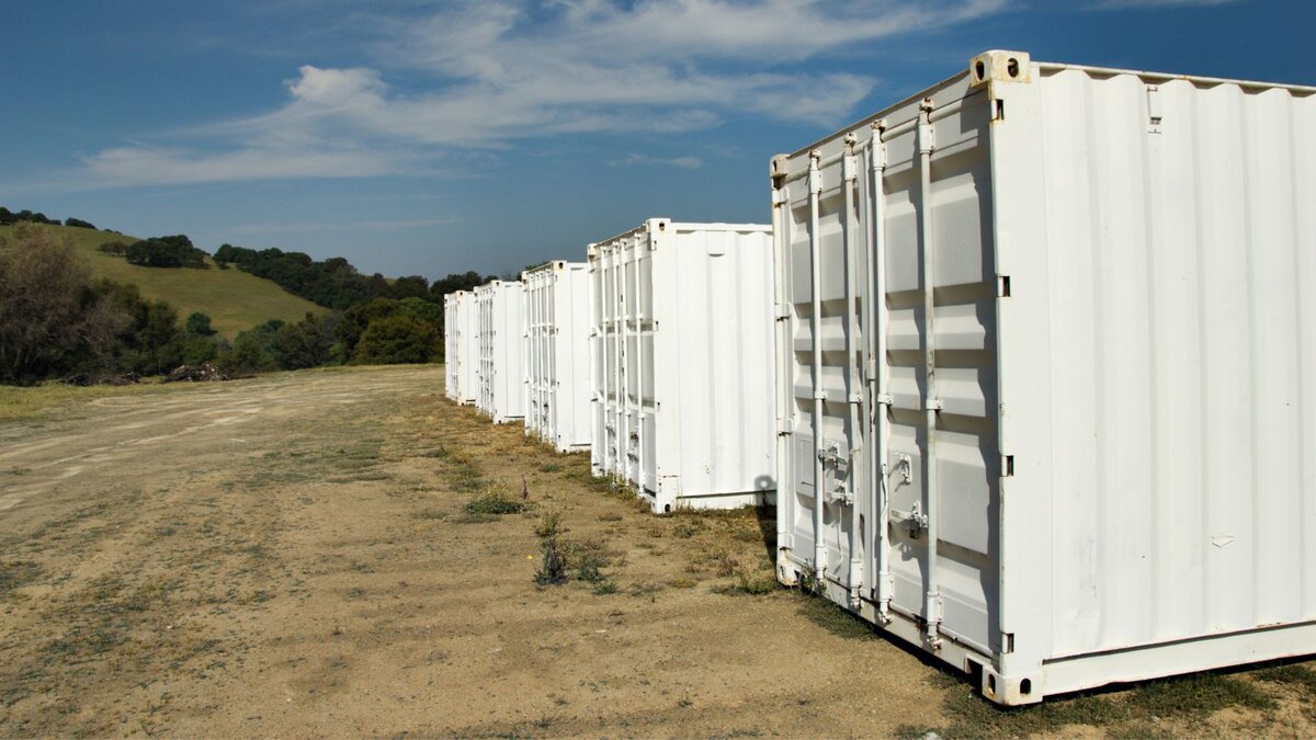 The exterior of a luxury shipping container home.