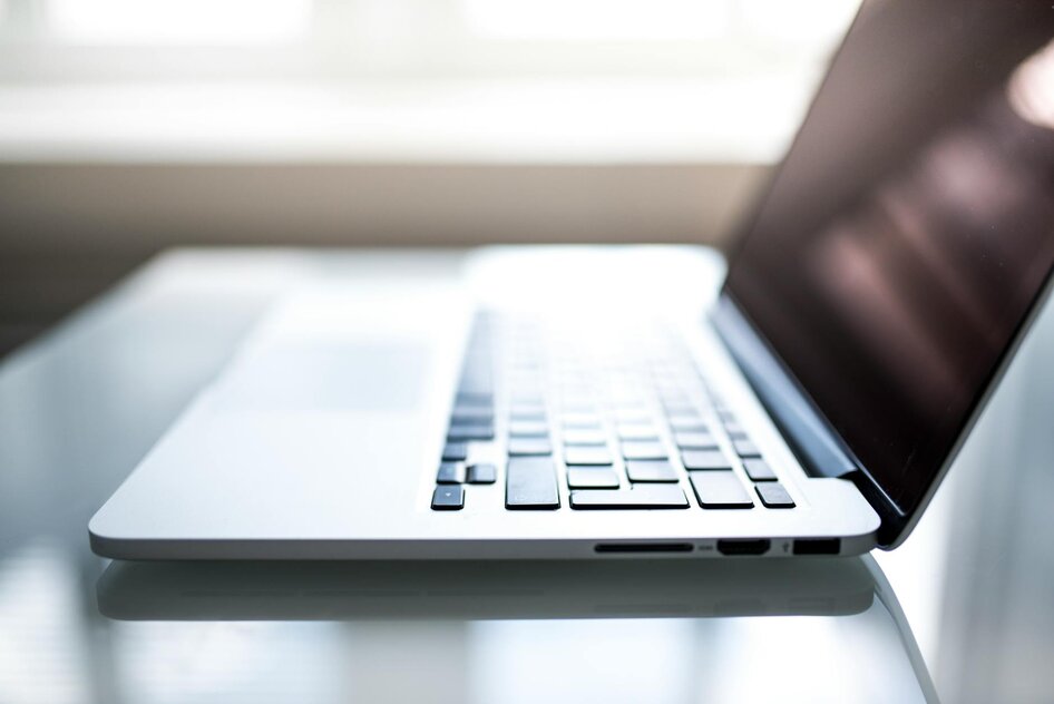 A laptop being used to purchase a shipping container online