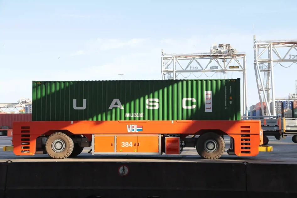 A shipping container (or conex box) loaded on a truck