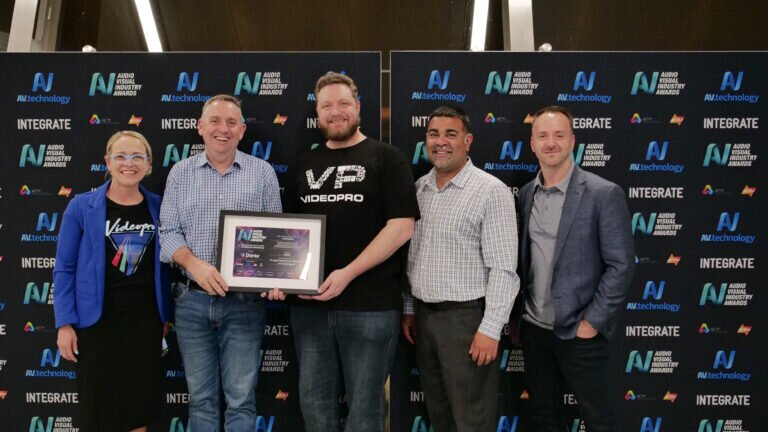 Videopro accepts the 2025 AVIA Award for Best Application of AV in Education
