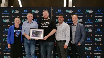 Videopro accepts the 2025 AVIA Award for Best Application of AV in Education