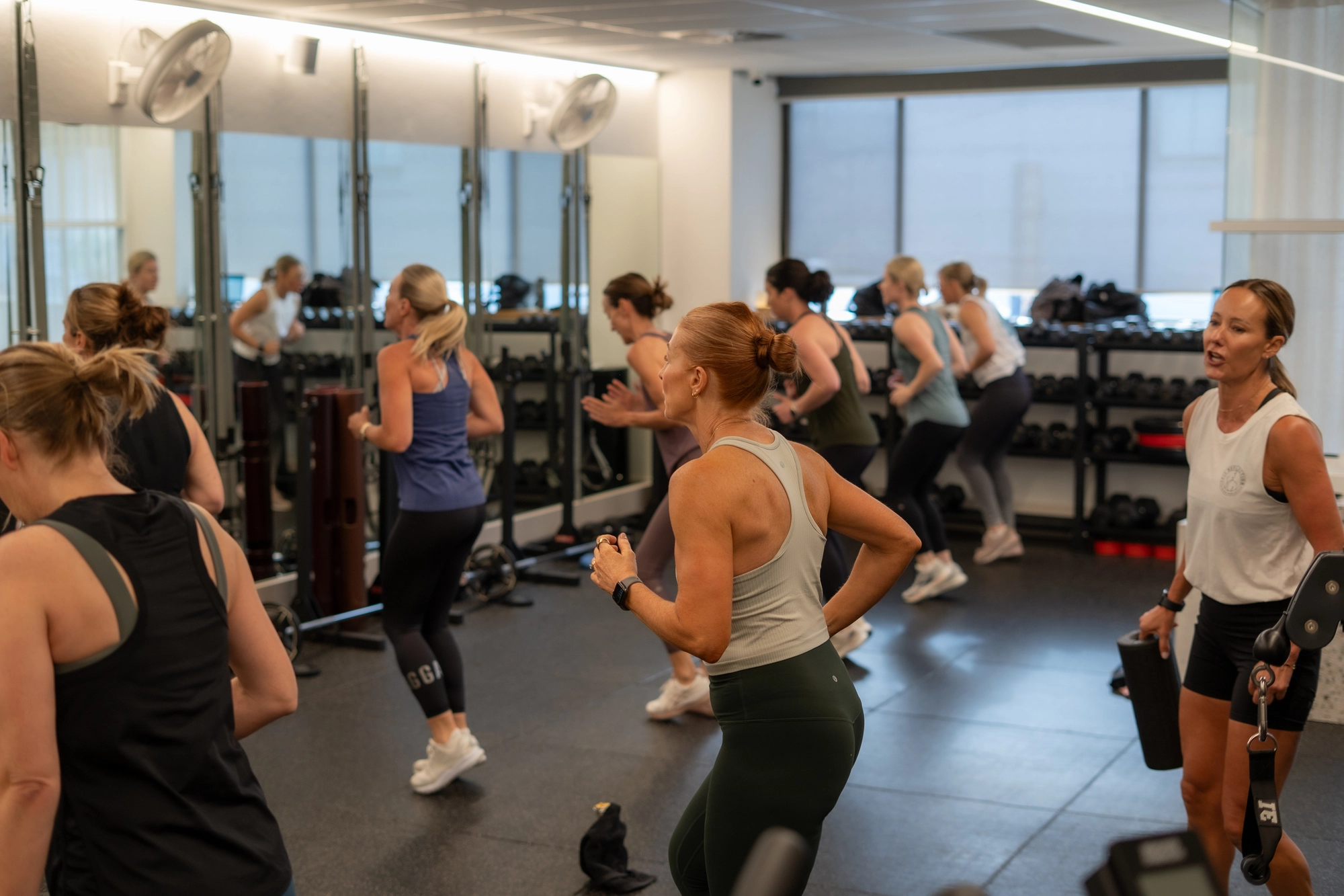 Women on treadmills and exercise bikes