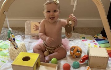 Baby playing with Lovevery toys