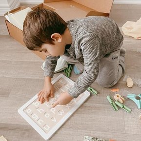Child playing with Lovevery toys