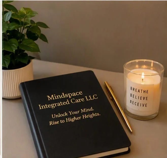 Mindspace Integrated Care journal and calming candle
