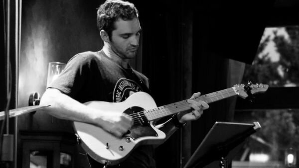 A poster for Jason Greenlaw event