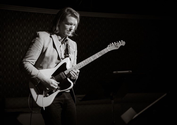 A poster for Dave Devine plays Grant Green event