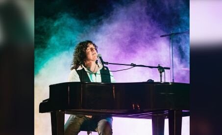 A poster for Bob Malone event