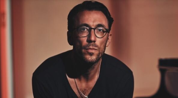 A poster for Bill Laurence event