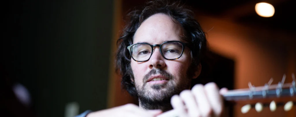 A poster for Andrew Marlin Stringband event