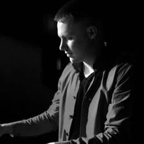 A poster for The Adam Ohlson Trio event