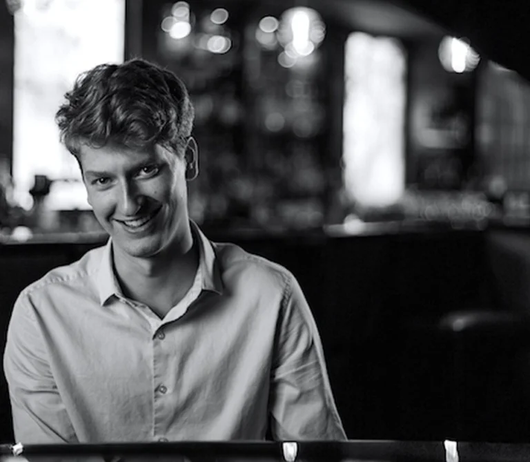 A poster for Spencer Zweifel Trio plays Burt Bacharach event