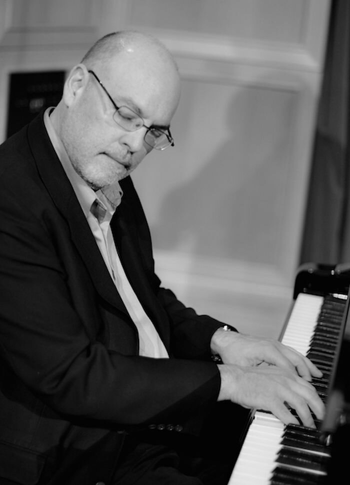 A poster for Dave Hanson Trio Celebrates Herbie Hancock event