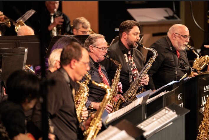 A poster for Arapahoe Community College Jazz Big Band: Directed by Doug Tidaback event