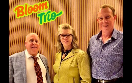 A poster for Bloom Trio event