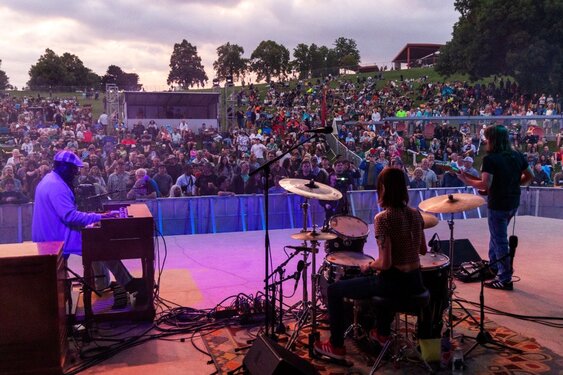 KUVO group in front of Five Points Media Center