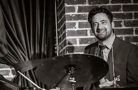 A poster for Brian Claxton Trio event