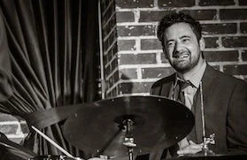 A poster for Brian Claxton Trio event