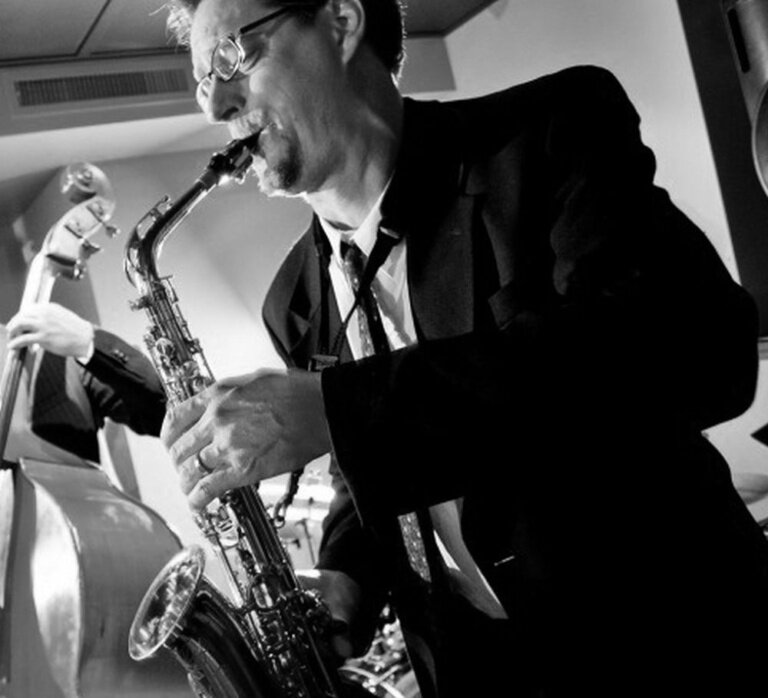 A poster for The Andrew Vogt Quartet event