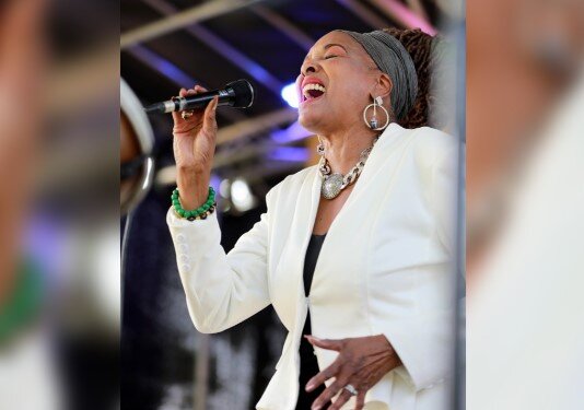 A poster for Linda Theus-Lee event