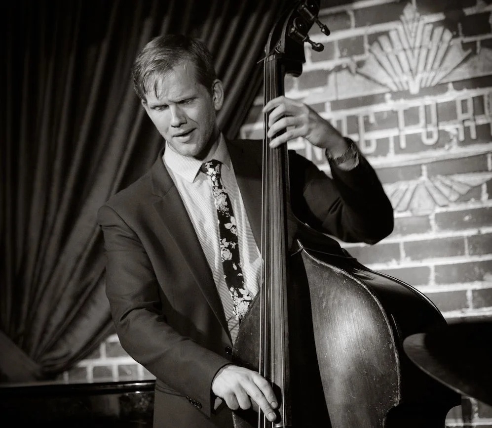 A poster for The Seth Lewis Quartet plays "The Bridge" event