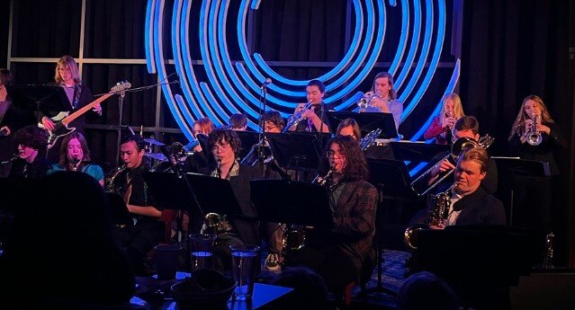 A poster for Heritage High School event