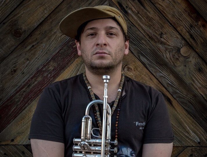 A poster for Eric Benny Bloom  event